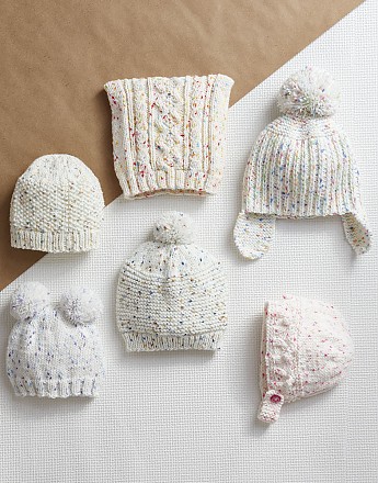 SELECTION OF BABY HATS IN SNUGGLY SUPERSOFT RAINBOW DROPS ARAN - Click to Enlarge