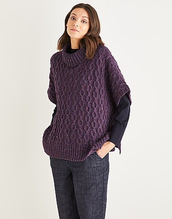 WOMEN’S CABLED ROLL NECK PONCHO IN SIRDAR HAWORTH TWEED - Click to Enlarge