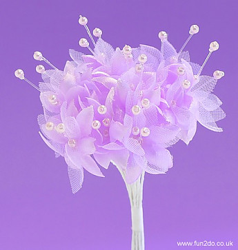 Lilac ColouredPearled Baby's Breath Flower  Button Hole. - Click to Enlarge
